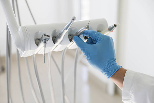 Professional Emergency Dentist technician working in Suwanee, GA